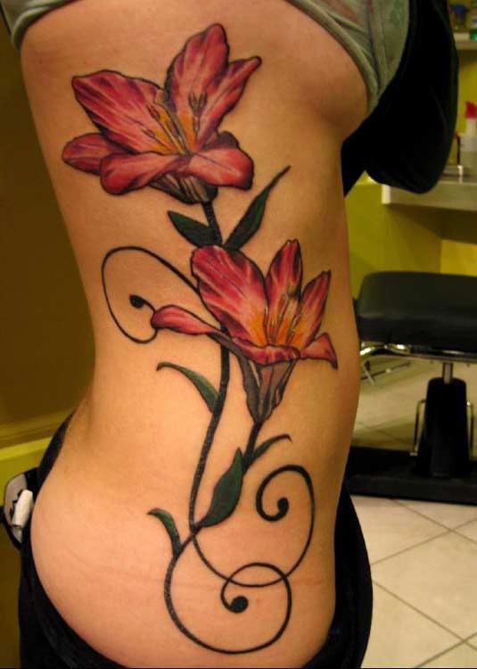 tattoos of flowers on hip. 2010 tattoos of flowers on hip