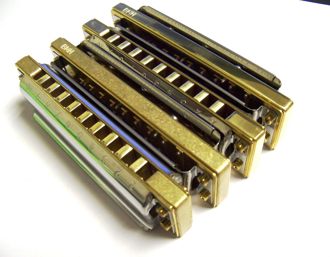 Marine Band Crossovers wtih Blue Moon Brass Combs.  Tumbled Finish and Polished Finish. photo 100_7834_zps52064834.jpg