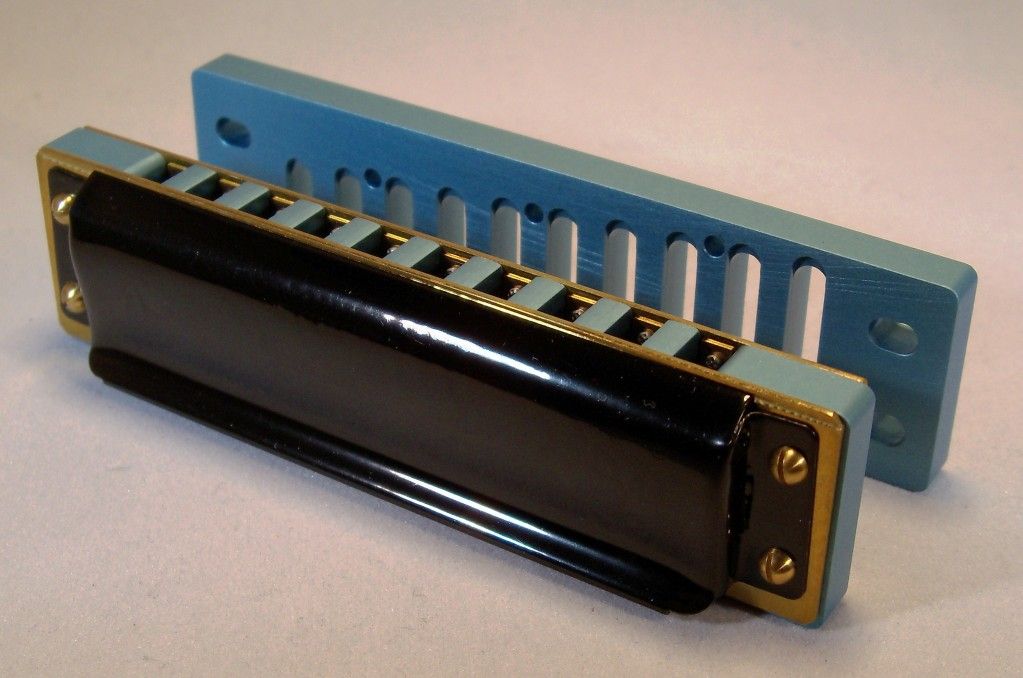 Marine Band Deluxe in Db, Beautiful Harmonica Creation from www.BlueMoonHarmonicas.com .  Brand New, never played Marine Band Deluxe outfitted with Gloss Black Powder Coated Cover Plates and a CNC Milled Blue Aluminum comb.