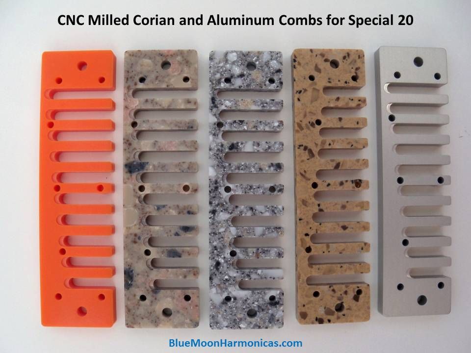 CNC Milled Corian and Aluminum Combs for Special 20, Beautiful precision CNC milled combs for Special 20.  The 4 on the left are Corian.  the silver one on the right is clear anodized aluminum.